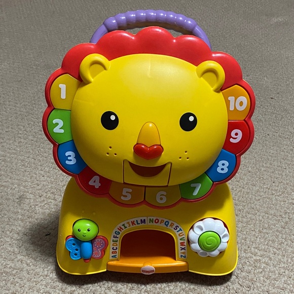 Fisher-Price Other - Fisher-Price 3-in-1 Sit, Stride &
Ride Interactive Lion